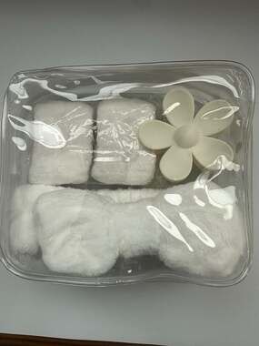 White 4-Piece Spa Set with Bow Headband, Wristbands, and Flower Claw Clip in Tra